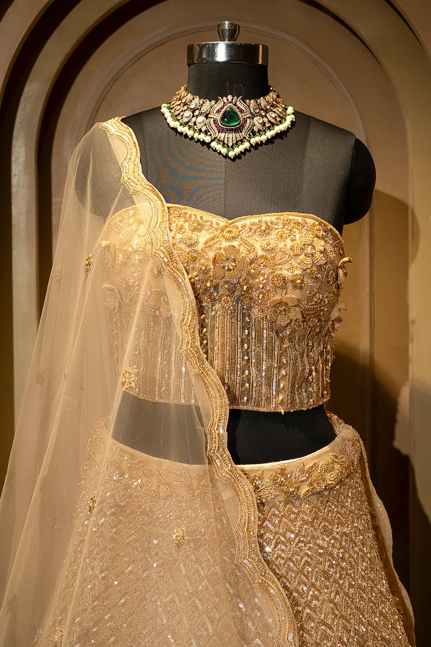 Champagne Gold Net Corset Lehenga with 3D Floral Appliqués and Architectural Cutwork - Image 4