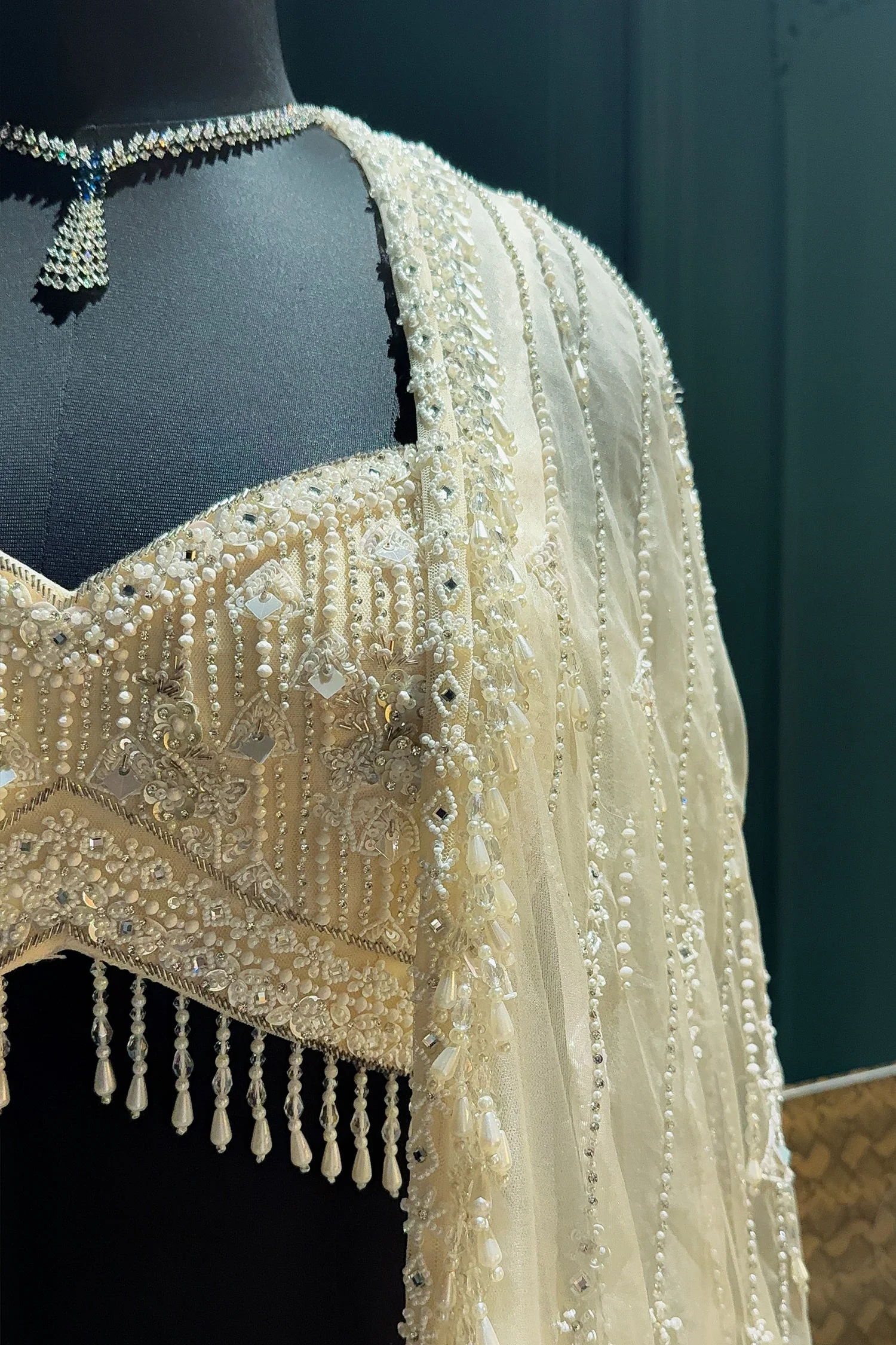 Ivory White Net Embellished Crop Top Lehenga with Long Shrug - Image 5
