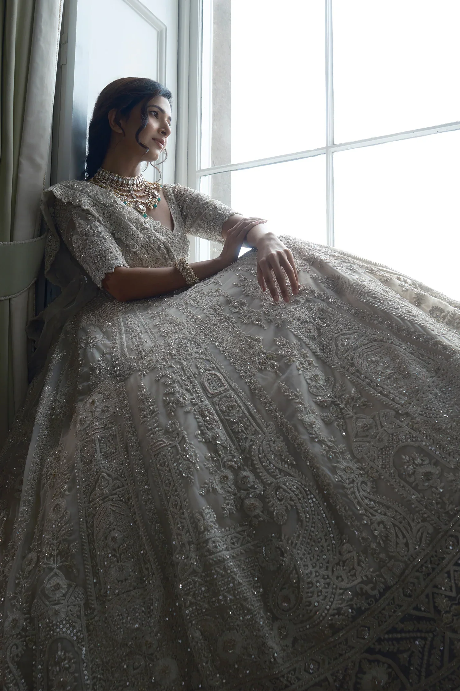 Off White Heavy Dori Embroidery Sequin Worked Lehenga in Net with Paisley and Floral Motifs - Image 2