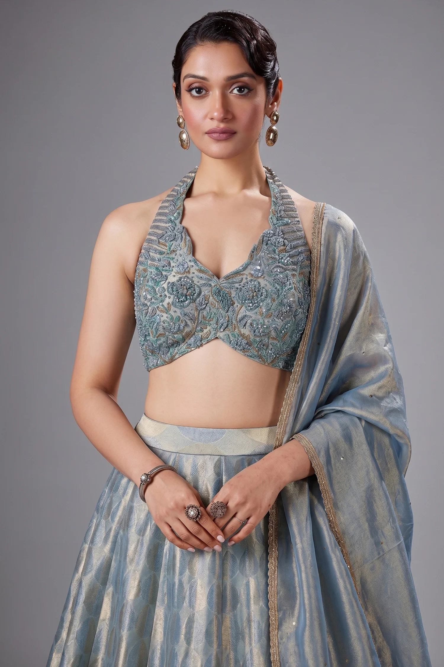 Powder Blue Tissue Silk Zari Woven Lehenga with Handworked Halter Neck Blouse - Image 2