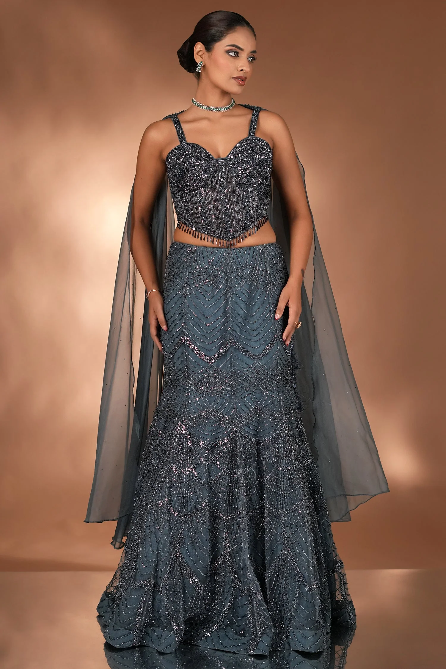 Prussian Blue Net Cutdana Beaded Mermaid Style Lehenga with Embellished Corset Blouse - Image 3