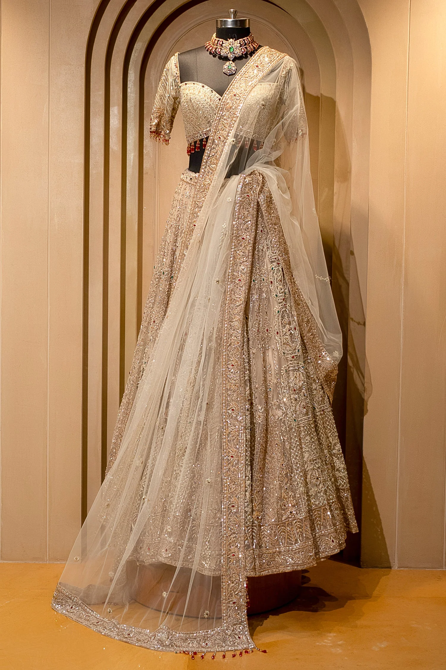 Royal Beige Net Bridal Lehenga with Luminescent Stone-Craft and Ethereal White Veil - Image 3
