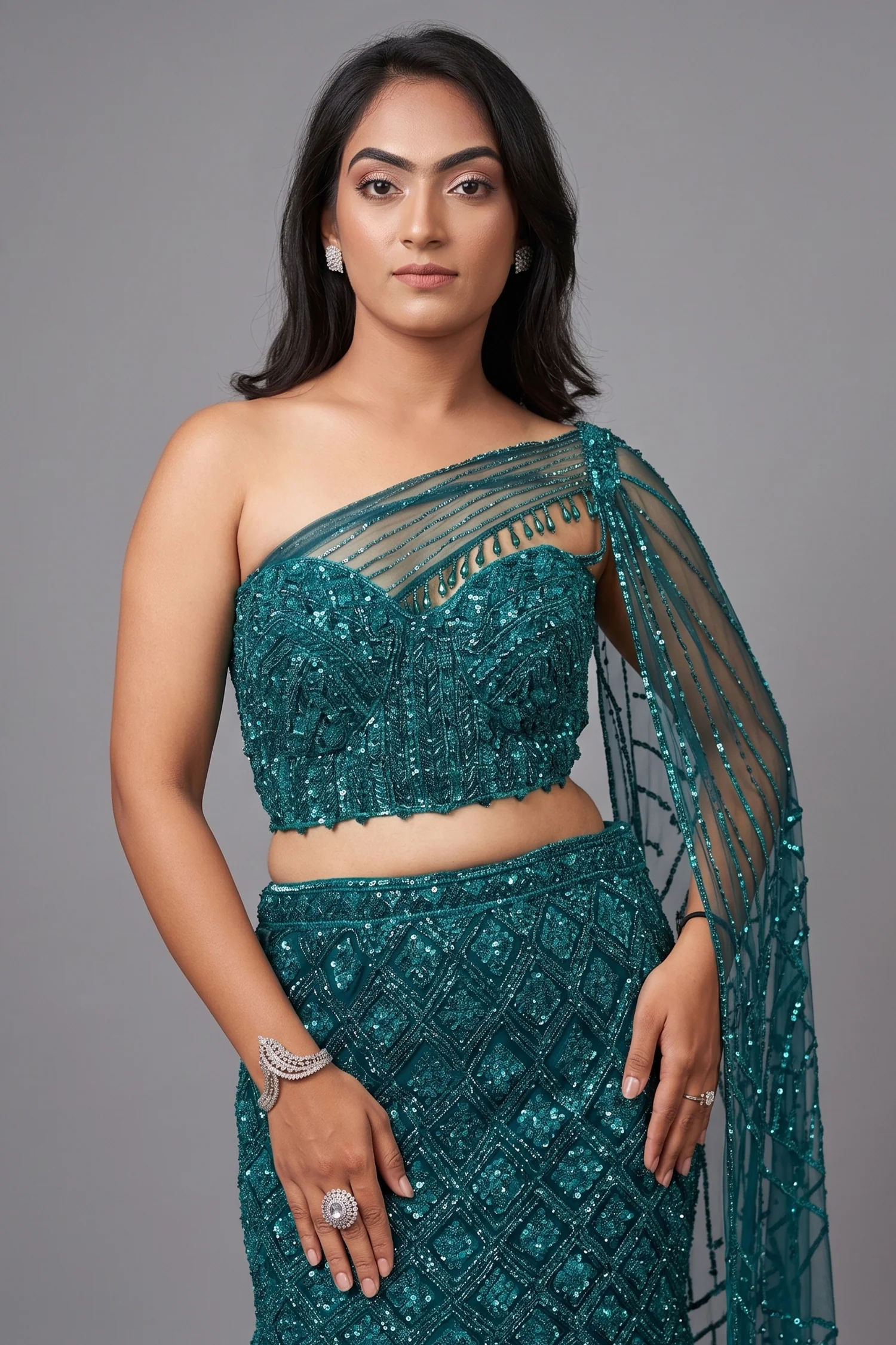 Teal Blue Net Embellishment Fish Cut Sequin Cutdana Work Lehenga with One Shoulder Cape Corset - Image 2